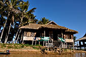 Inle Lake Myanmar. All the buildings are constructed on piles. Residents travel around by canoe, but there are also bamboo walkways and bridges over the canals, monasteries and stupas. 